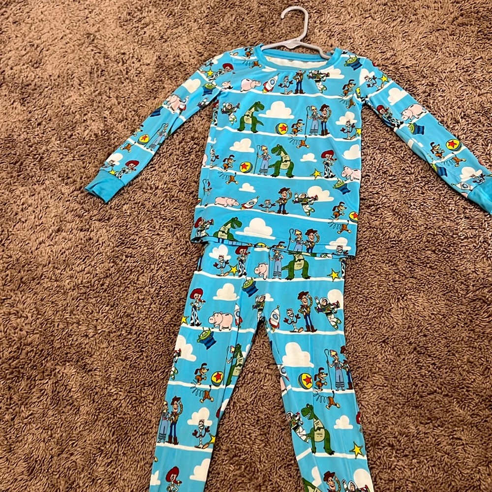 Little Sleepies Toy Story 2T (2 pinhole in knee)